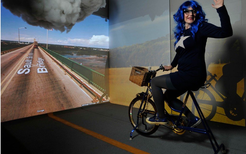 Dr. Megan L Smith demonstrates her networked stationary bike